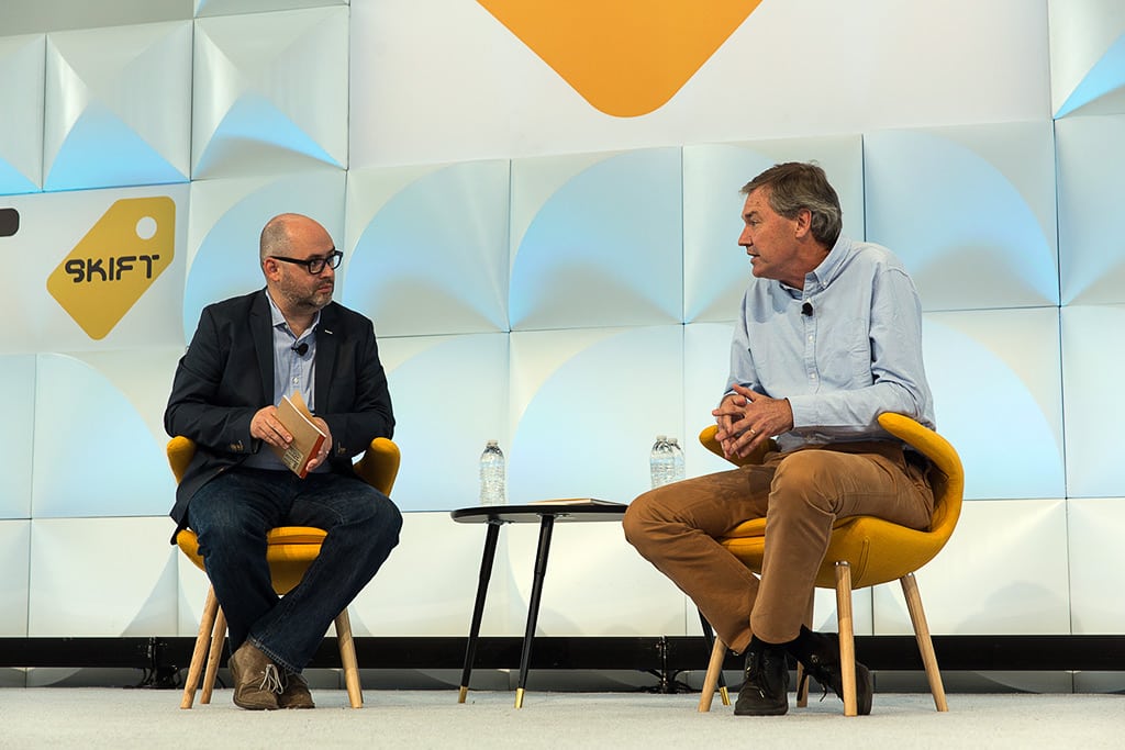 Darrell Wade (right) spoke at the Skift Global Forum with moderator Jason Clampet, Skift's co-founder and head of content, in Brooklyn, New York on October 14, 2015.