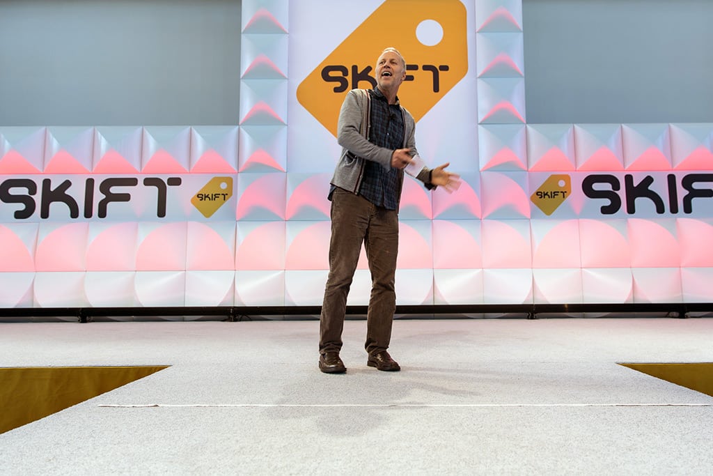 Chris Collins speaking at Skift Global Forum in Brooklyn, New York, on October 15, 2015. 