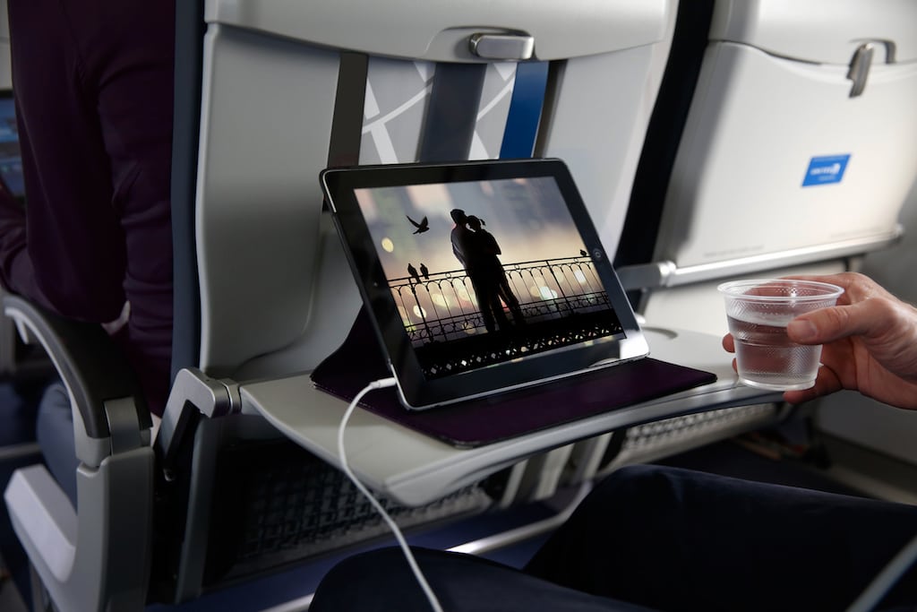 United is poised to give passengers the option of paying for Wi-Fi will miles. Pictured, United’s in-flight entertainment system enables flyers to stream movies and TV shows to their laptops and mobile devices.