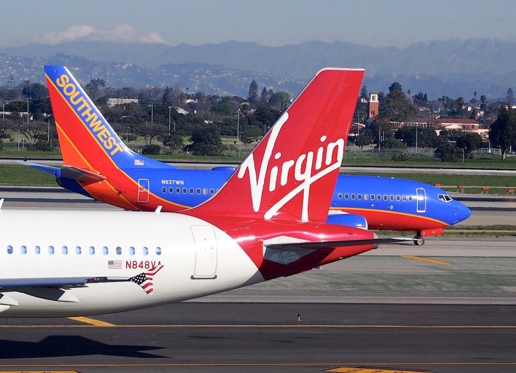 Virgin America and Southwest Airlines planes taxiing in Los Angeles.