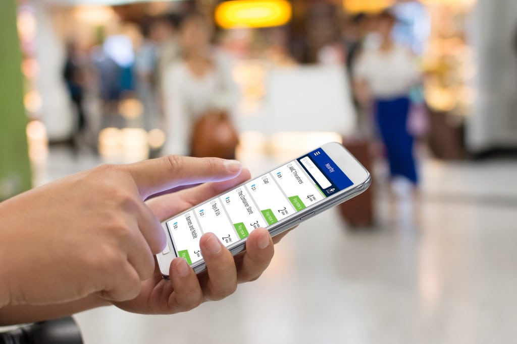 Travel management companies are offering more mobile services to clients.