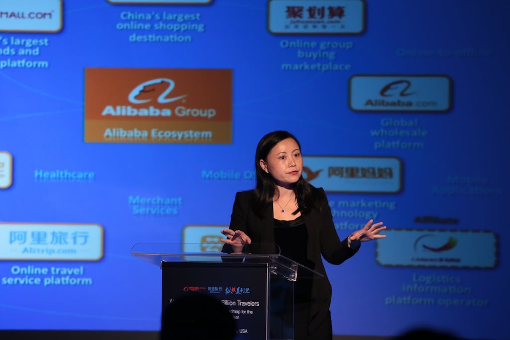 Alitrip chief strategy officer Sherri Wu speaks at the company's Attracting China's 1.3 Billion Travelers conference in Los Angeles. 