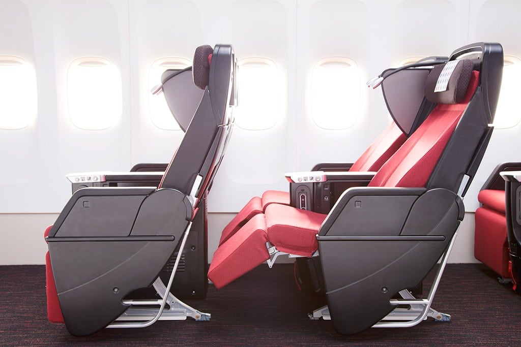 Japan Airlines' Premium Economy Seat reclines forward, to avoid conflicts in the back. 