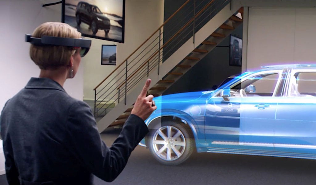 Volvo is using Microsoft's HoloLens augmented reality glasses to educate car buyers about hybrid technology and machine learning.