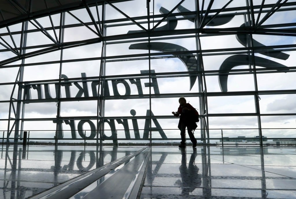 A passenger walks through a terminal at Frankfurt Airport.