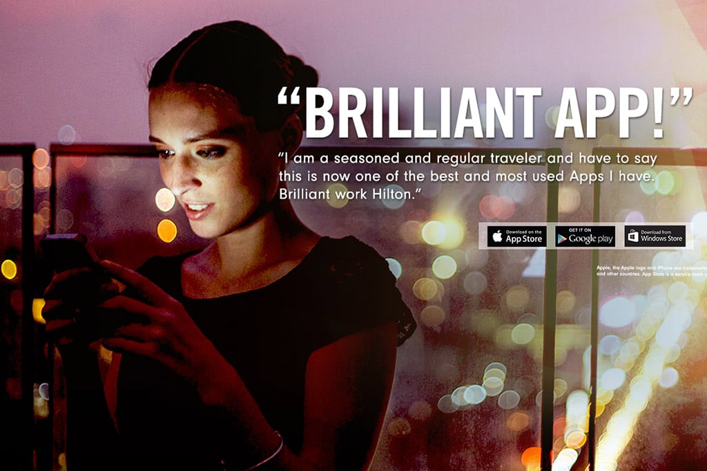A promotional image for Hilton HHonor's mobile app. 