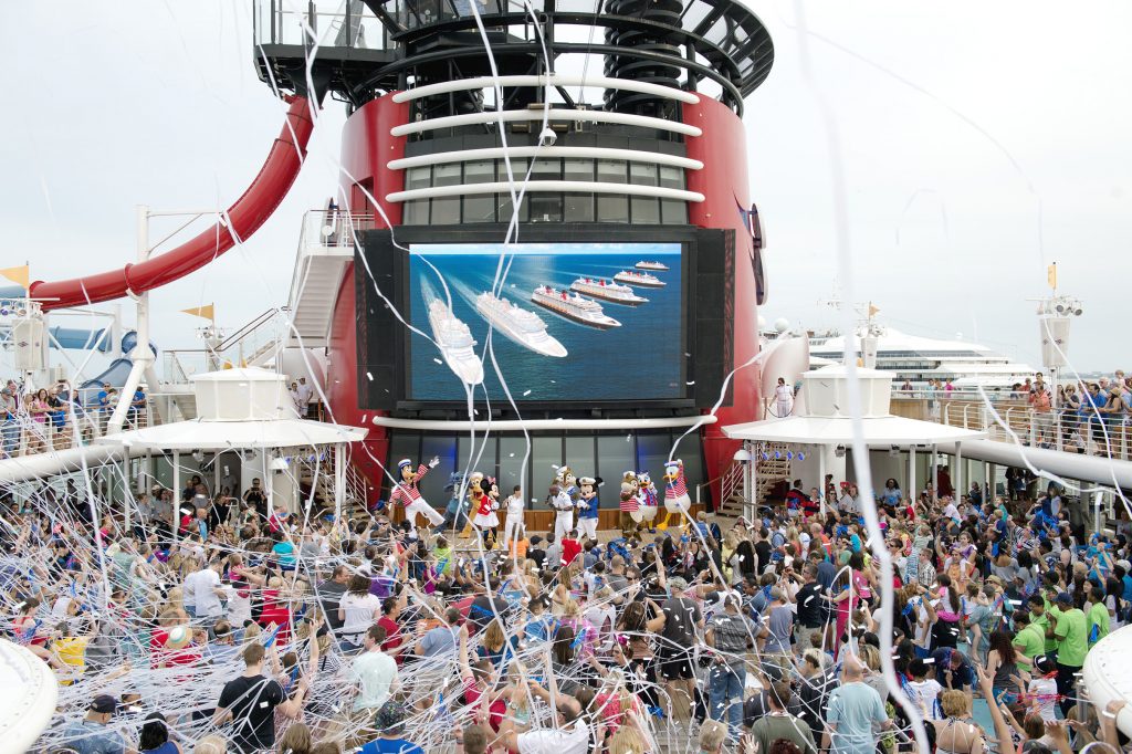 Disney Cruise Line celebrates with guests on the Disney Magic  following the announcement that The Walt Disney Company will add two more ships. 