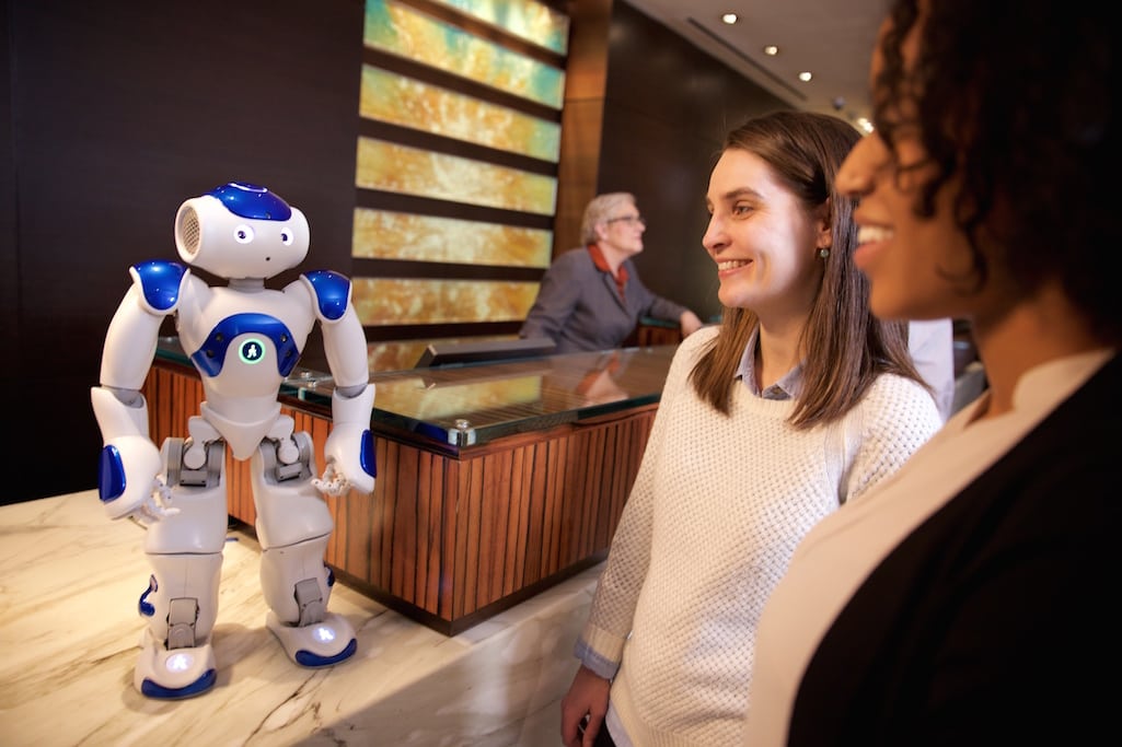 Visitors to the Hilton Hotel in McLean, Virginia, meet "Connie," a robot concierge powered by IBM Watson and WayBlazer. 