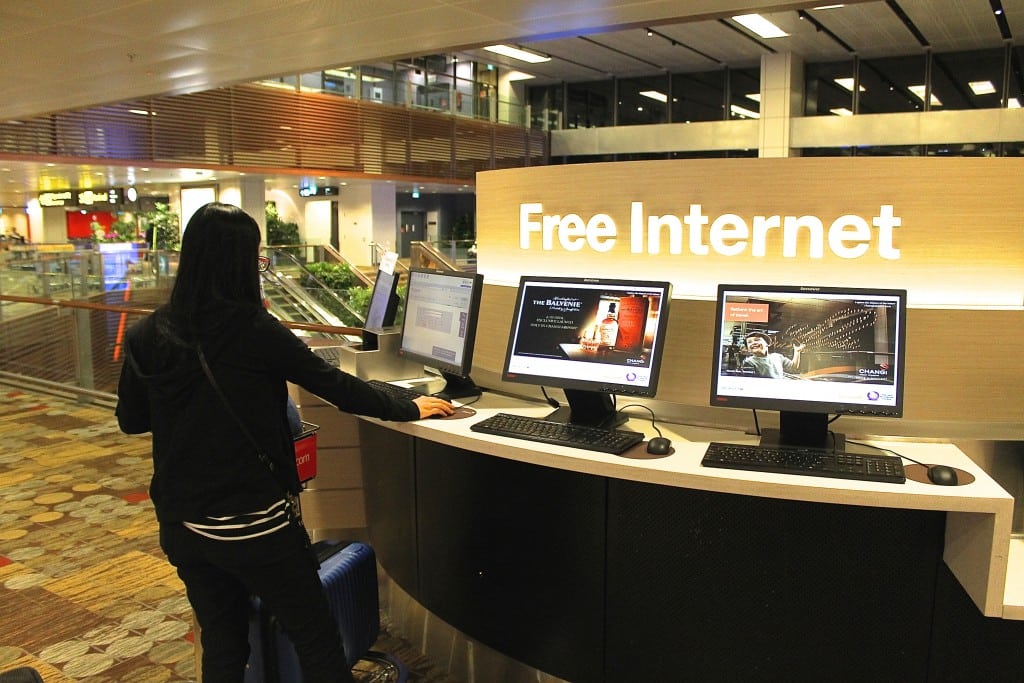 Quality airport Wi-Fi and a great in-flight experience can help influence a traveler to revisit a destination, according to a new study. Pictured is a kiosk at Singapore's Changi Airport.