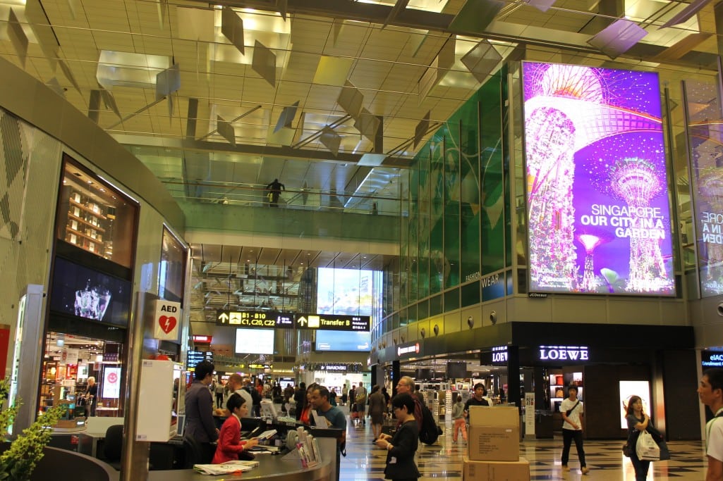 Passengers outside stores at Singapore's Changi Airport. 