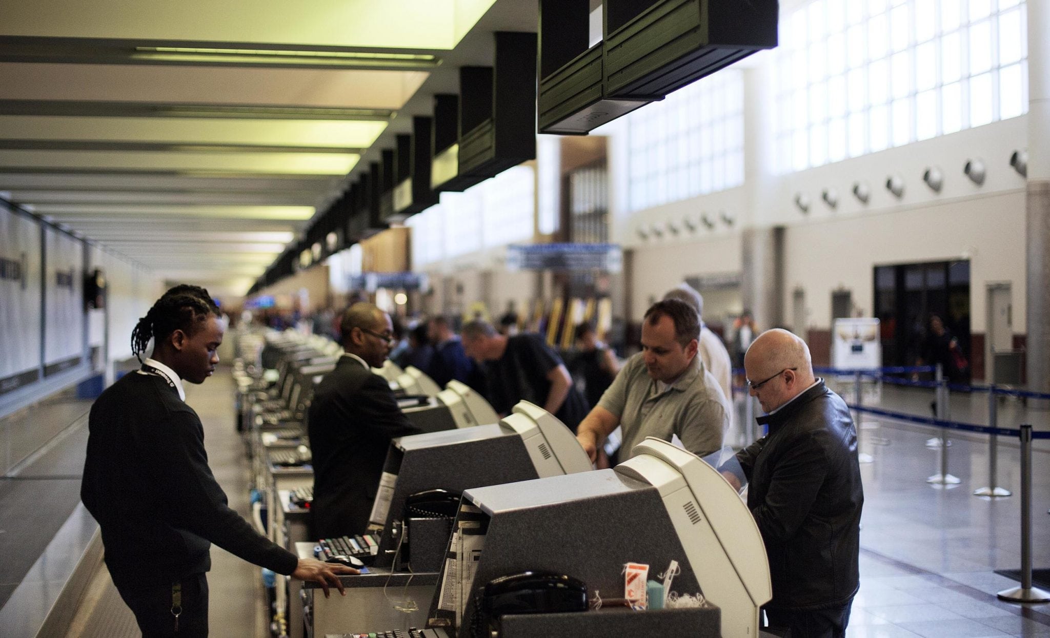 In this March 10, 2016 file photo, passengers check-in at the North terminal of the domestic passenger terminal at Hartsfield-Jackson Atlanta International Airport in Atlanta.