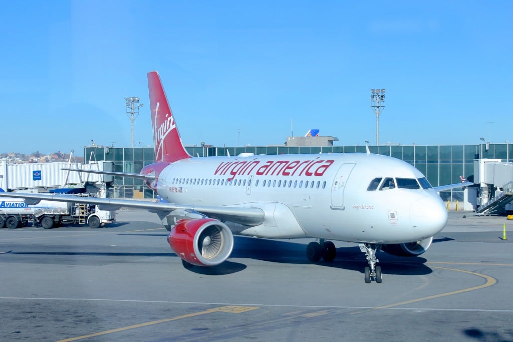A Virgin America aircraft taxis to a gate at LaGuardia Airport in New York City.