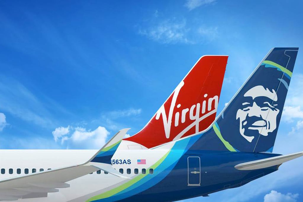 Alaska Airlines has taken another step to absorb Virgin America into its operations. Pictured are one of Virgin America's Airbus jets, and one of Alaska's Boeing jets.