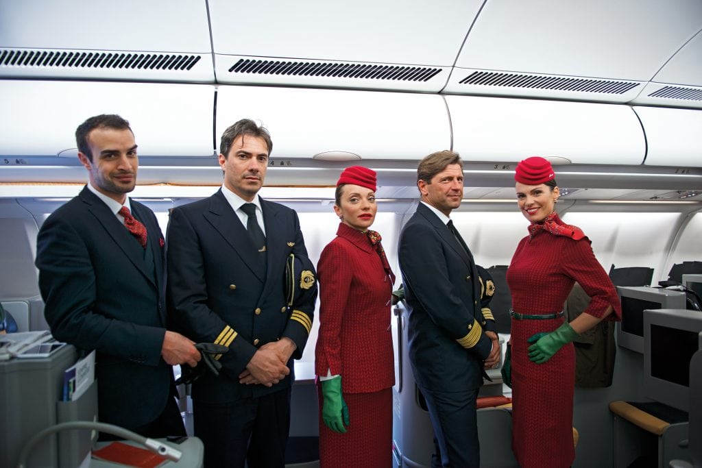 Alitalia crew members in new uniforms unveiled this week as part of a larger repositioning of the Italian carrier. 