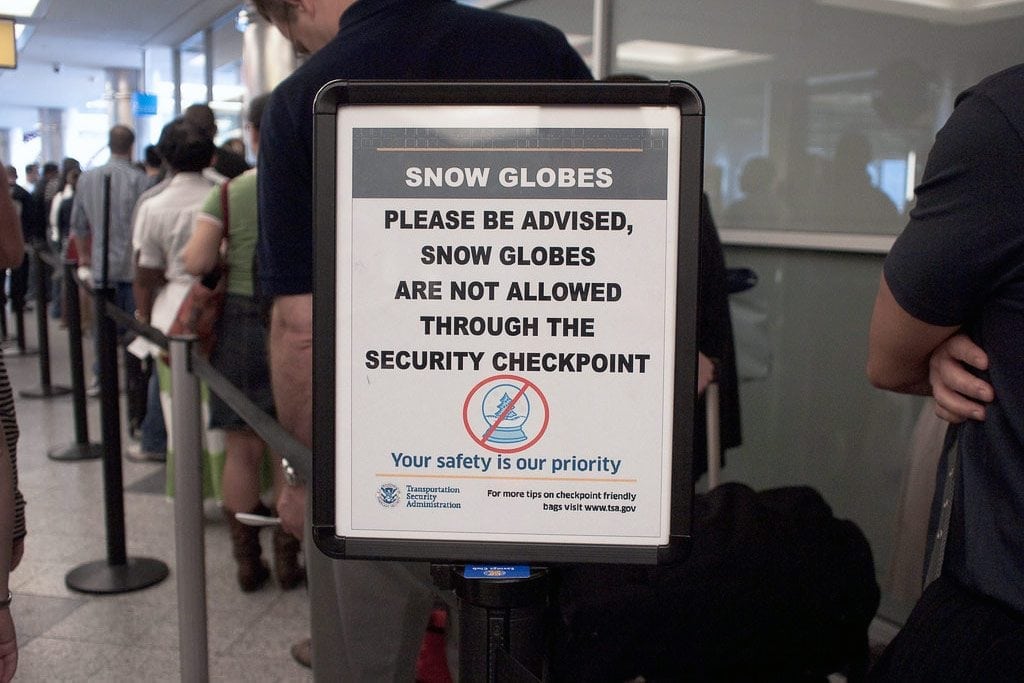 Passengers at security checkpoint run by the TSA at New York's Laguardia Airport.  
