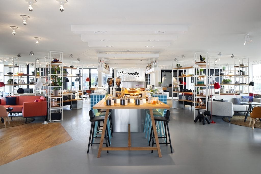 The shared living and kitchen area at Zoku Amsterdam. 