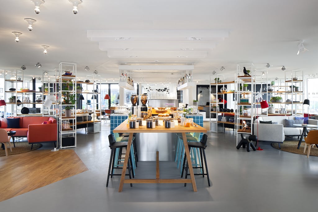 The shared living and kitchen area at Zoku Amsterdam. 
