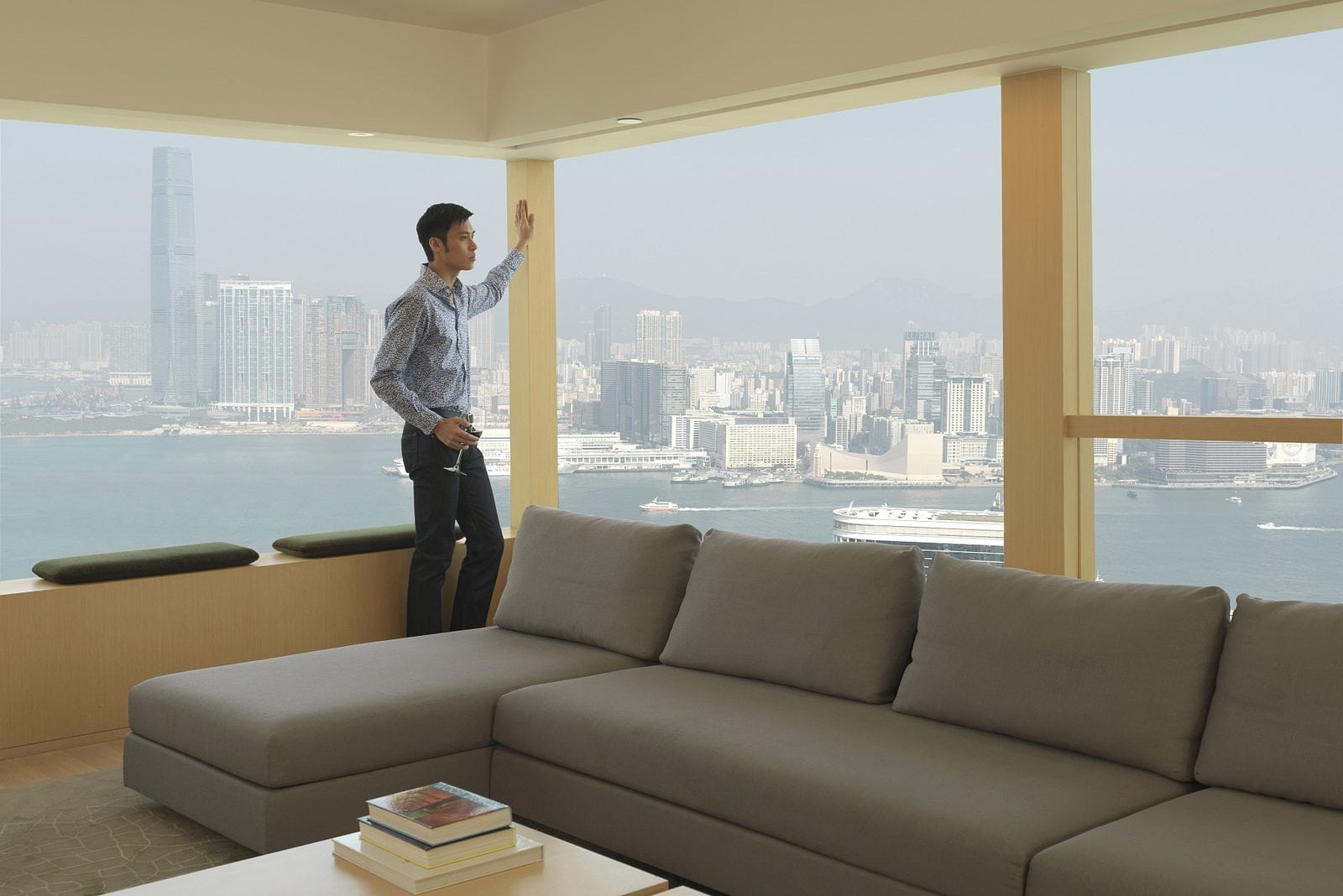 A man in a room at the Upper House in Hong Kong, which uses a light touch rather than big data. 