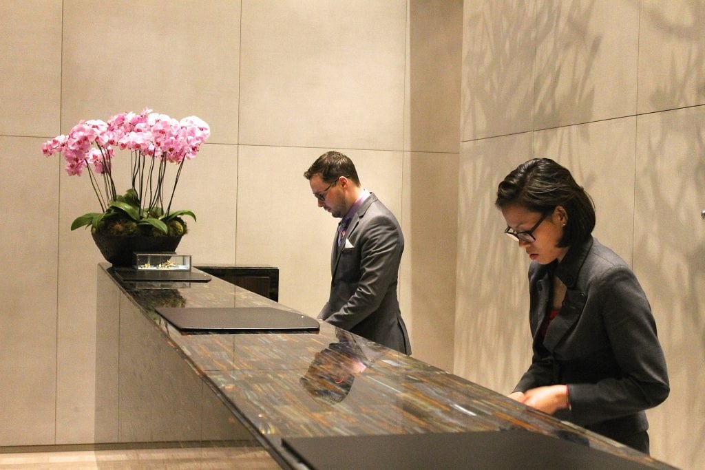 Front desk employees at Four Seasons Hotel Toronto.