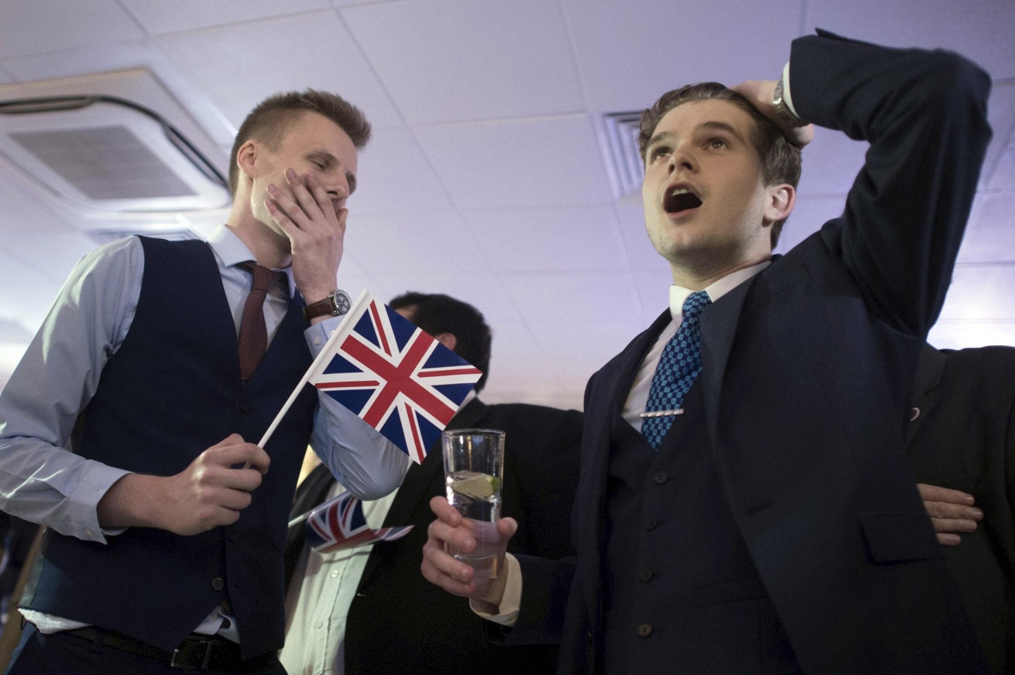 Supporters of leaving the EU celebrate at a party hosted by Leave.EU in central London as they watch results come in from around the country after Thursday's EU referendum, Friday, June 24, 2016. 
