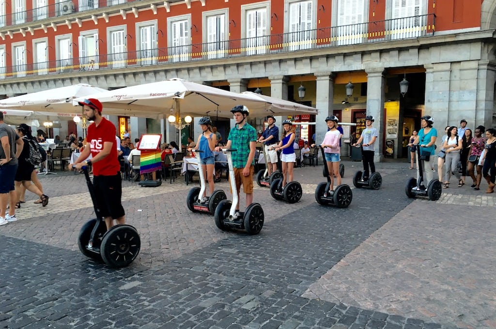 Tourists on a Segway tour of central Madrid, Spain, in July 2016. The country's tourism numbers have been set back by over a decade by the events of 2020. 