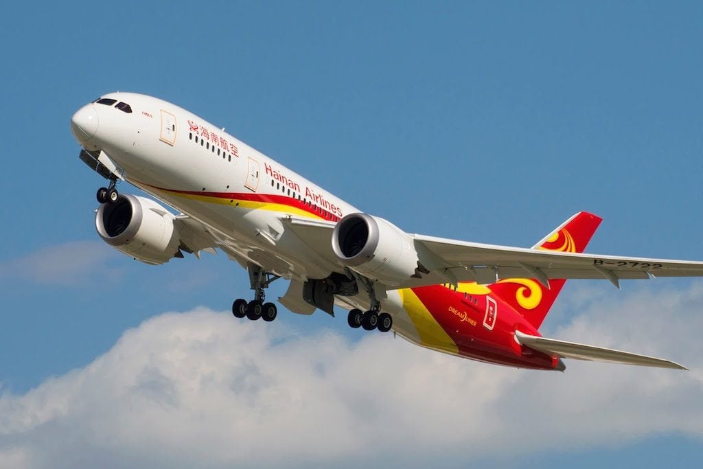 A financial unit of sprawling conglomerate HNA Group offered to repay investors with vouchers in HNA-owned Hainan Airlines, one of whose aircraft is shown flying here.