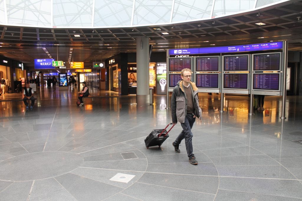 A traveler walking to his gate at Frankfurt Airport. International business travel to the U.S. saw more growth than leisure travel in 2015.