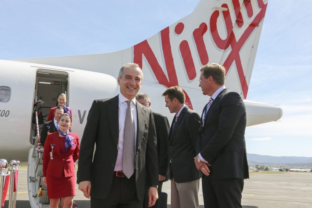 Under CEO John Borghetti (center), Virgin Australia expects to expand into China. 