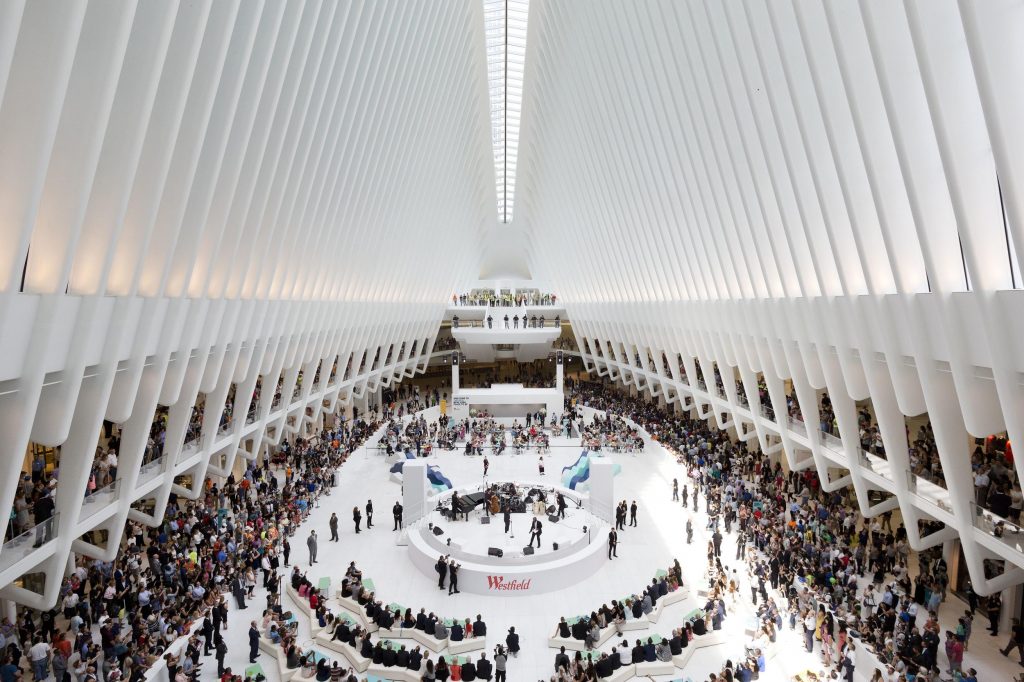 Crowds gather for a celebration for the opening of the Westfield World Trade Center mall in the oculus of the Transportation Hub, Tuesday, Aug. 16, 2016, in New York.