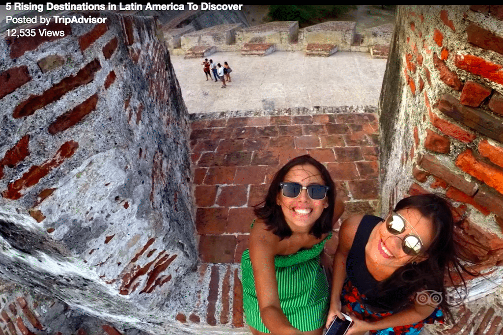 Tripadvisor is pushing users to book their trips on TripAdvisor via mobile phones. Pictured are vacationers in Cartagena, Colombia.