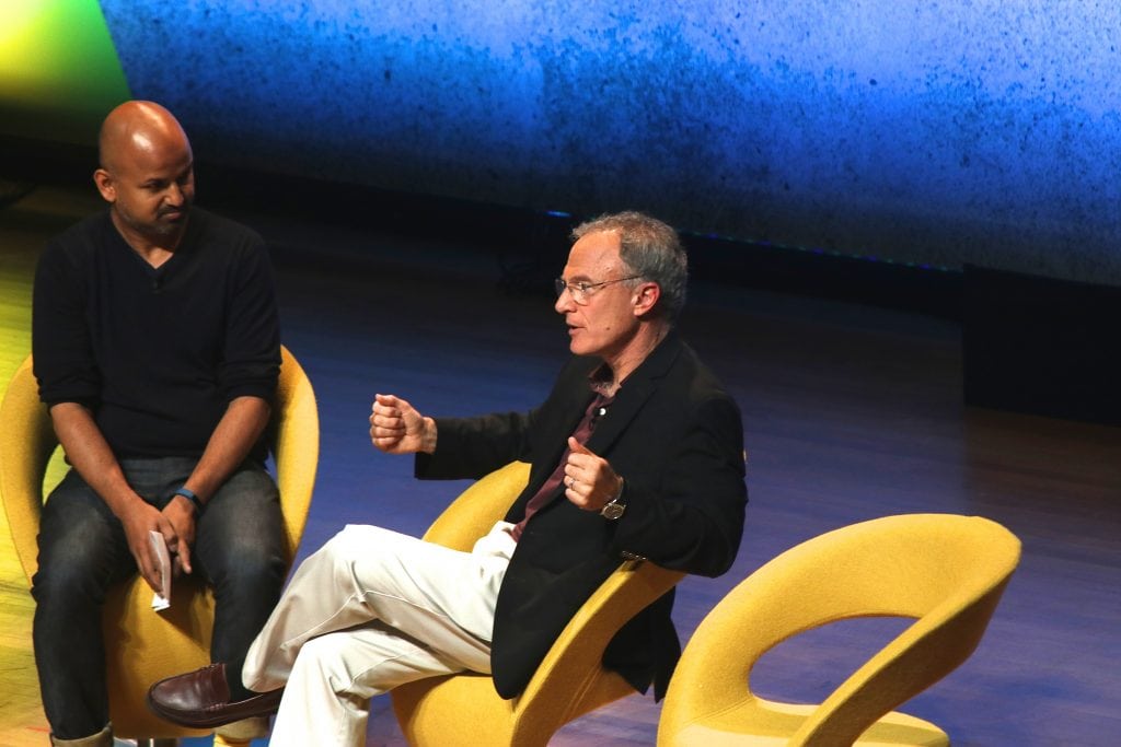 TripAdvisor CEO Stephen Kaufer (right) told Skift CEO Rafat Ali during the Skift Global Forum in September that TripAdvisor was committed to seeing the company's Instant Booking initiative succeed. 