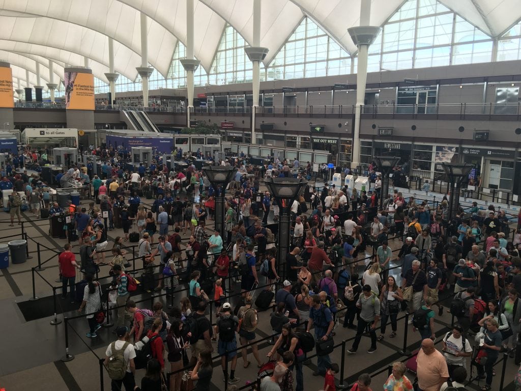 Regardless of age, business travelers hate waiting in security lines the most, according to new research from GBTA. Here, flyers wait in line at the TSA checkpoint at Denver International Airport in July 2016.
