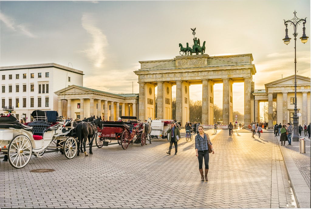 Business travel from the U.S. to Europe stayed strong in 2016, according to a Travel Leaders Group survey, despite terror fears. Here, travelers wander around Berlin's Brandenburg Gate in 2014.