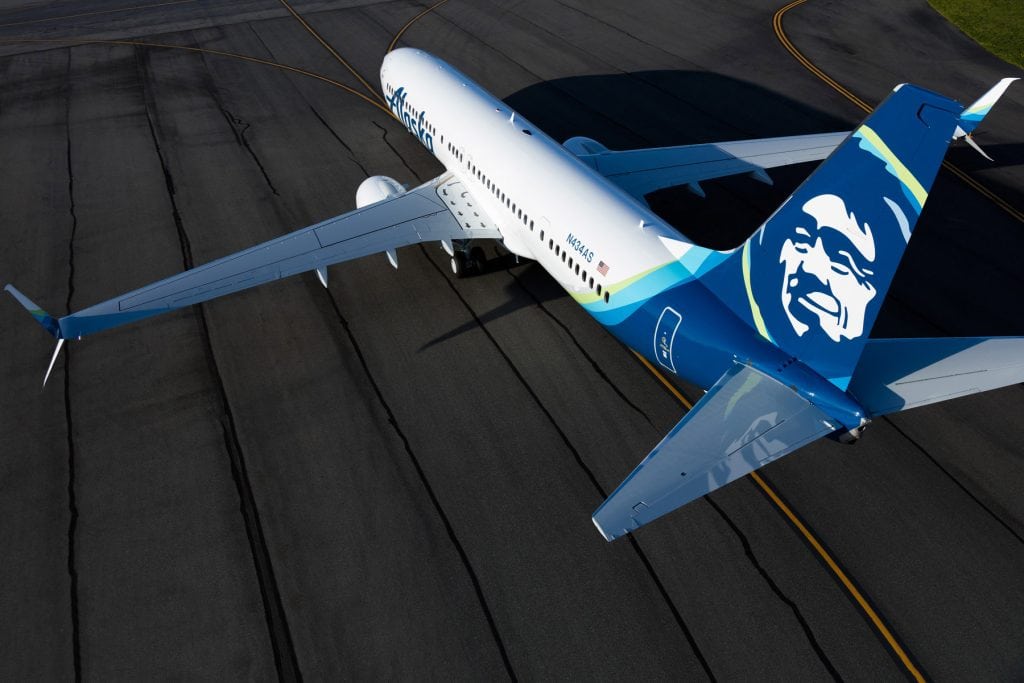 An Alaska Airline planes on the tarmac. The airline has changed its strategy recently, offering more discount tickets and fewer high-priced, last-minute tickets. 