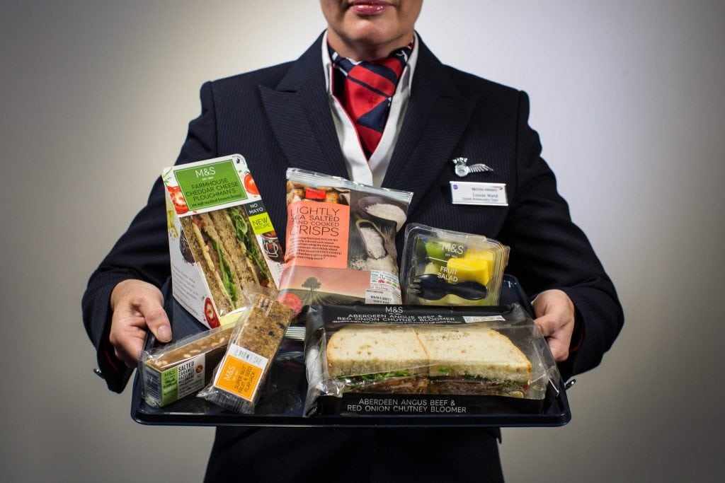 A promotional image featuring British Airways' new food collaboration with Marks and Spencer. Some passengers may not be pleased about paying for food on short-haul flights.