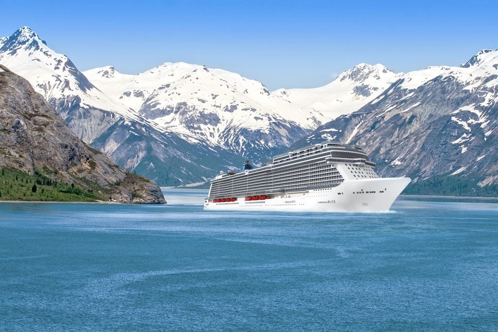 A rendering of the Norwegian Bliss is shown against a backdrop of mountains in Alaska. Norwegian Cruise Line is sending a new ship to Seattle for Alaska sailings for the first time.
