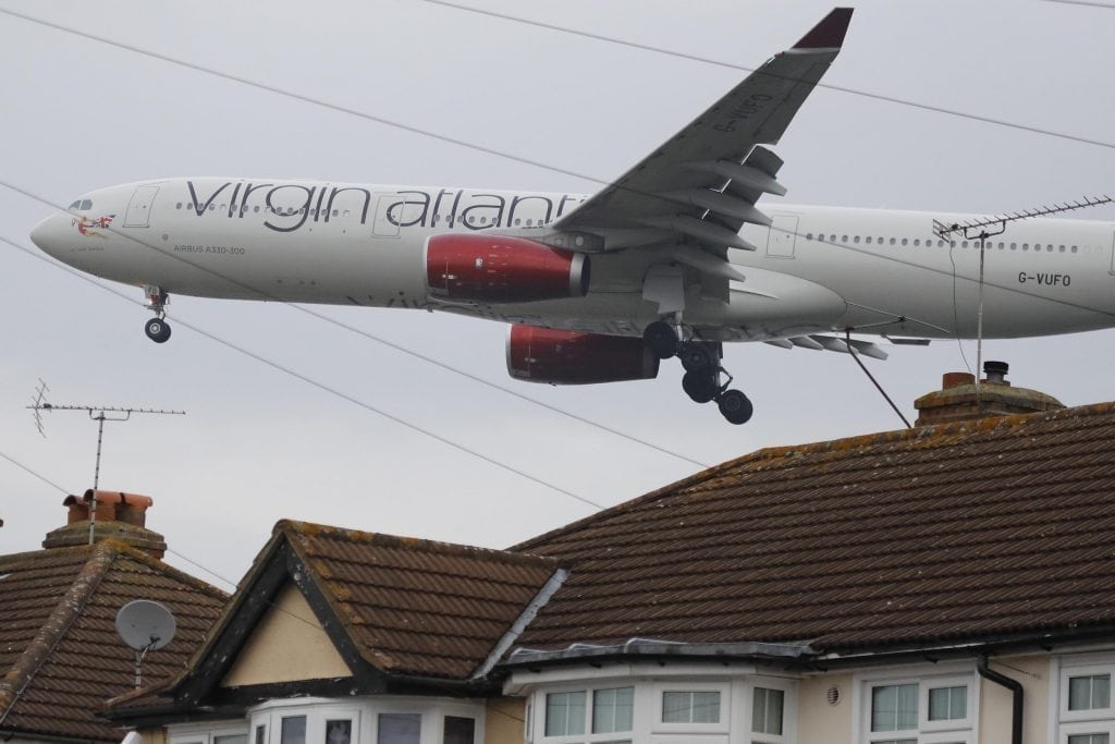 A Virgin Atlantic plane prepares to land at London Heathrow Airport. The company aims to capitalize on Heathrow's expansion. 