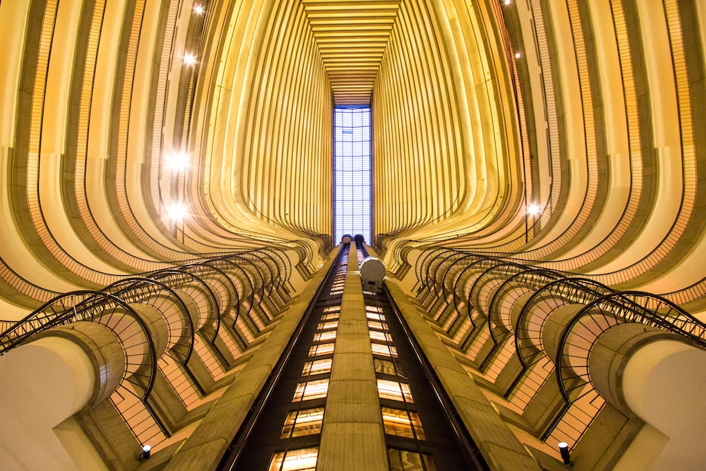 Top travel executives say business travel is edging downward a bit despite some relative improvement in recent months. The inside of the Marriott Marquis Atlanta is pictured here.