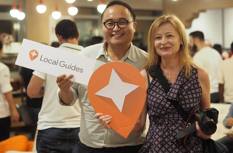 Google is now providing incentives and badges for review-writing to its Google Local Guides. Pictured are two guides at a Google event in November 2016 in Dubai, United Arab Emirates.