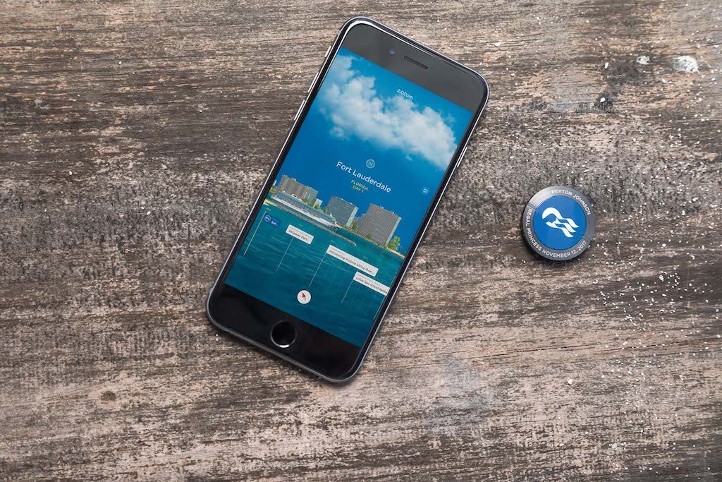 A promotional image of Carnival Corporation's Ocean Medallion and mobile app.
