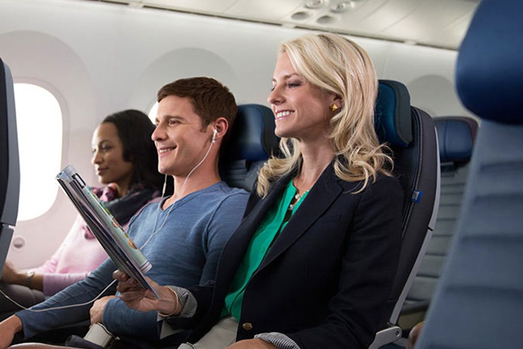 These United basic economy passengers look happy in a promotional photo from the airline. But the no-frills fares aren't working out so well for the airline.