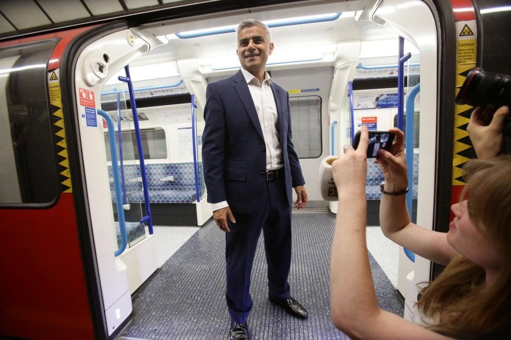 Mayor of London Sadiq Khan poses for the media on a Victoria line tube train carriage at Brixton Underground station in London during the launch of London's Night Tube last summer. He's proposed a tax on tourism in London. 