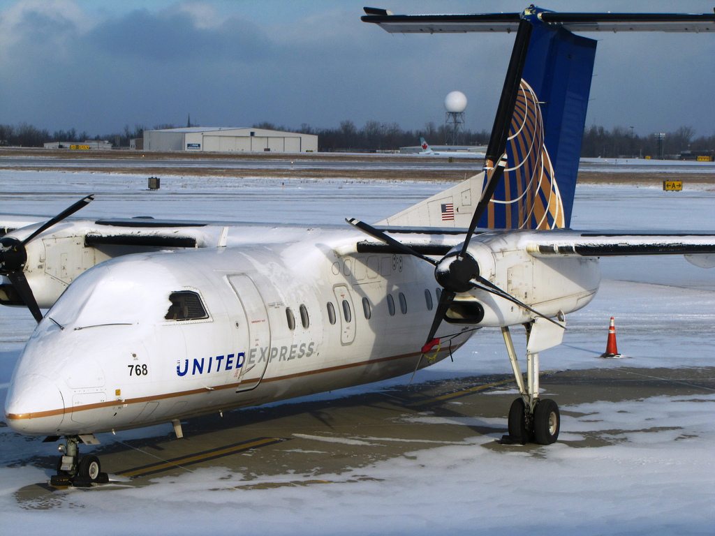 A United Express Bombardier Q200 on the ground in Buffalo. United has been flying this turboprop between two of its hubs — Newark and Washington Dulles. 