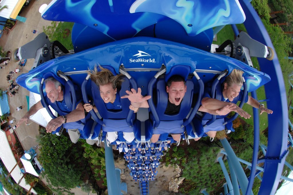 Riders are shown on the Manta roller coaster at a SeaWorld park. Parent company SeaWorld Entertainment reported that revenues, profits, and attendance fell in 2016. 
