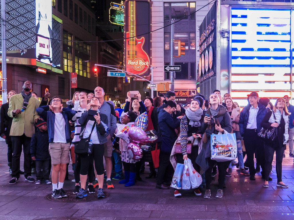 New York City is preparing for a weaker year of international visitation. Pictured are tourists in New York City's Times Square.