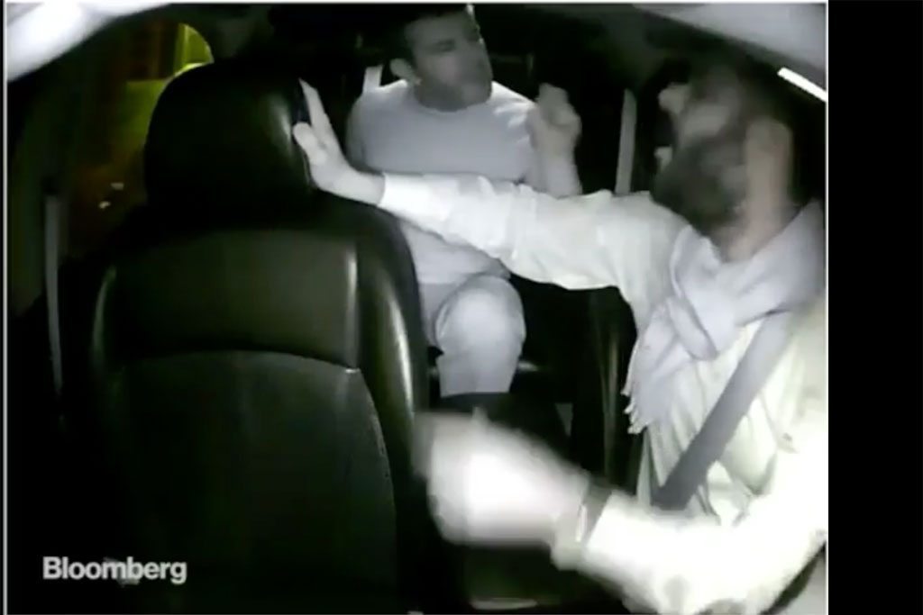 A still from a leaked dash cam recording of a black car driver getting into an argument with Uber CEO Travis Kalanick, who tells the driver to take responsibility for his own financial problems.