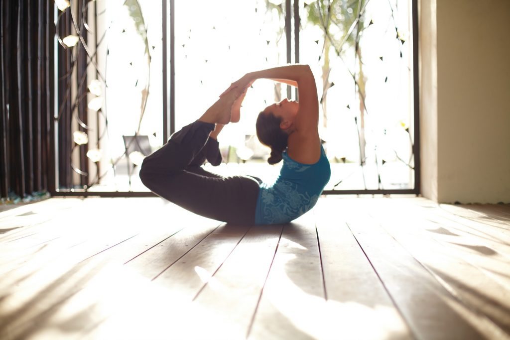 The Carillon Miami Wellness Resort was rebranded with a flexible kind of wellness tourism in mind. Pictured is a guest at one of the resort's yoga classes.