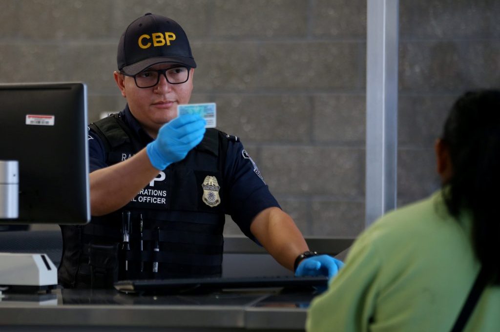 International arrivals data collection in the United States has been flawed for years. Pictured is a U.S. Customs and Border Patrol officer interviewing travelers entering the United States from Mexico at the border crossing in San Ysidro, California.  