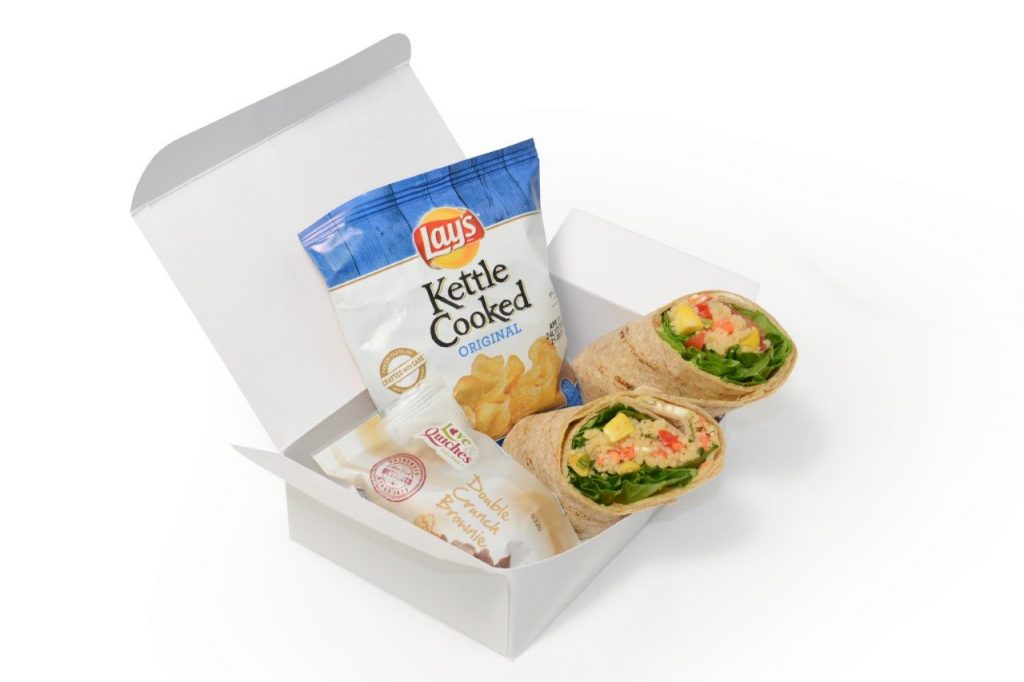 American Airlines will serve free meals, like this sandwich wrap, on flights from New York to Los Angeles and San Francisco. 