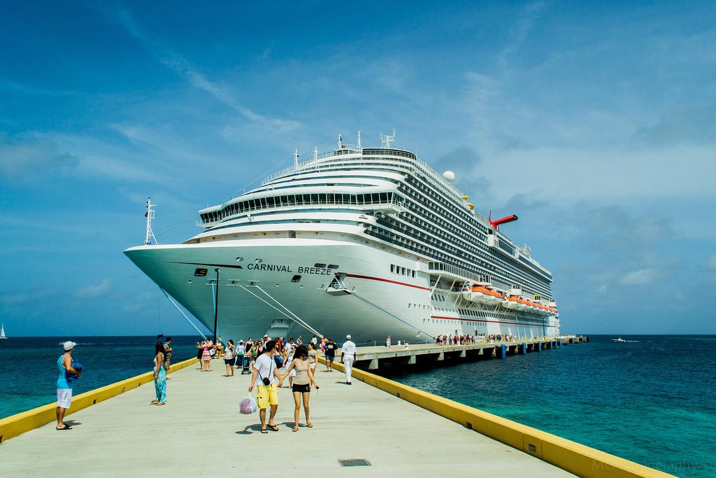 Carnival Corp. reported strong first-quarter earnings Tuesday, though itinerary disruptions in China could put a damper on the growing cruise business there. Here, the Carnival Breeze is shown in the Turks and Caicos.